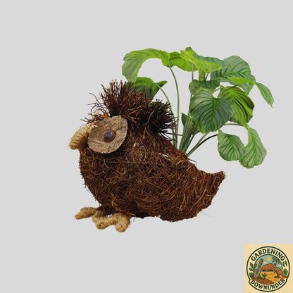 Eco-friendly owl planter crafted from natural materials creating a unique focal point in gardens and homes.